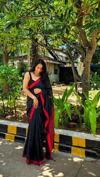 Handloom black cotton saree with red contrast border